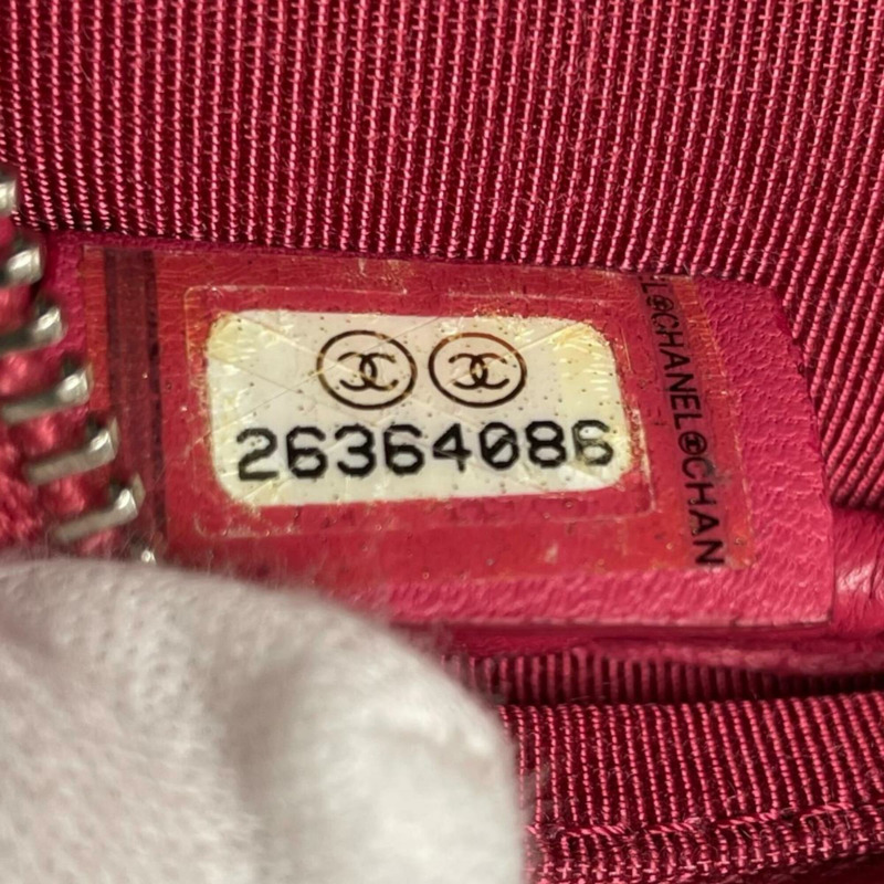 香奈兒 (Chanel) 圓形鏈條肩背包，飾有 Coco 標誌，絎縫迷你款，羊皮，A70657 粉紅色-11