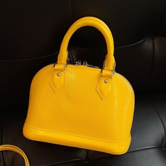 路易威登/Louis Vuitton 檸檬黃水波紋 Alma BB 貝殼手提包-1