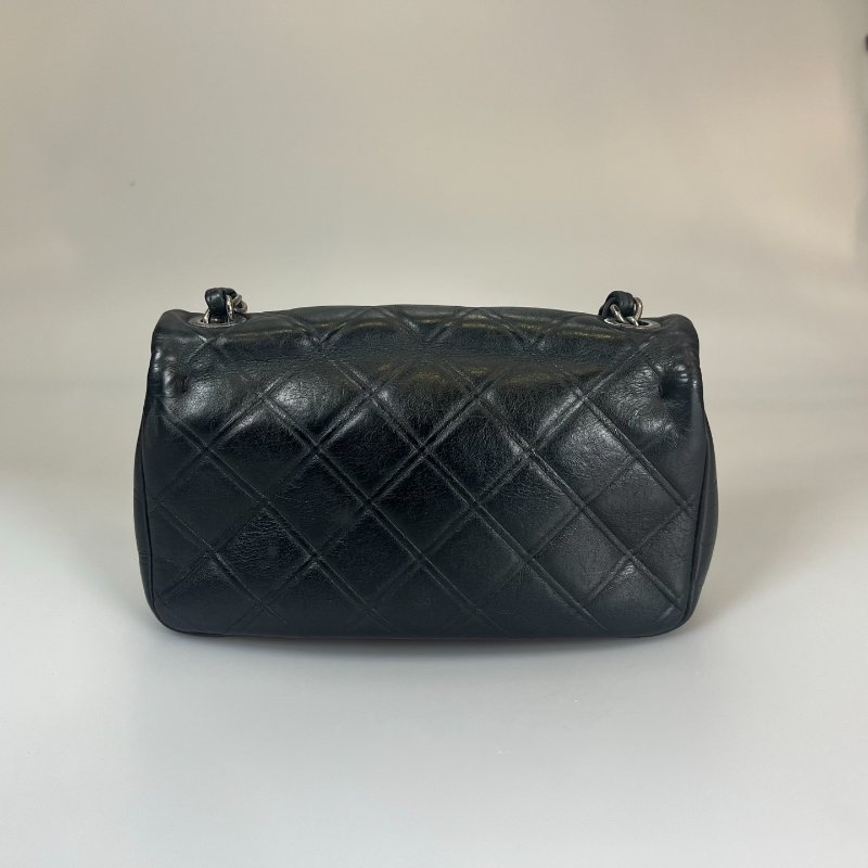 CHANEL 季節款肩背包牛皮黑 保卡款18開-1