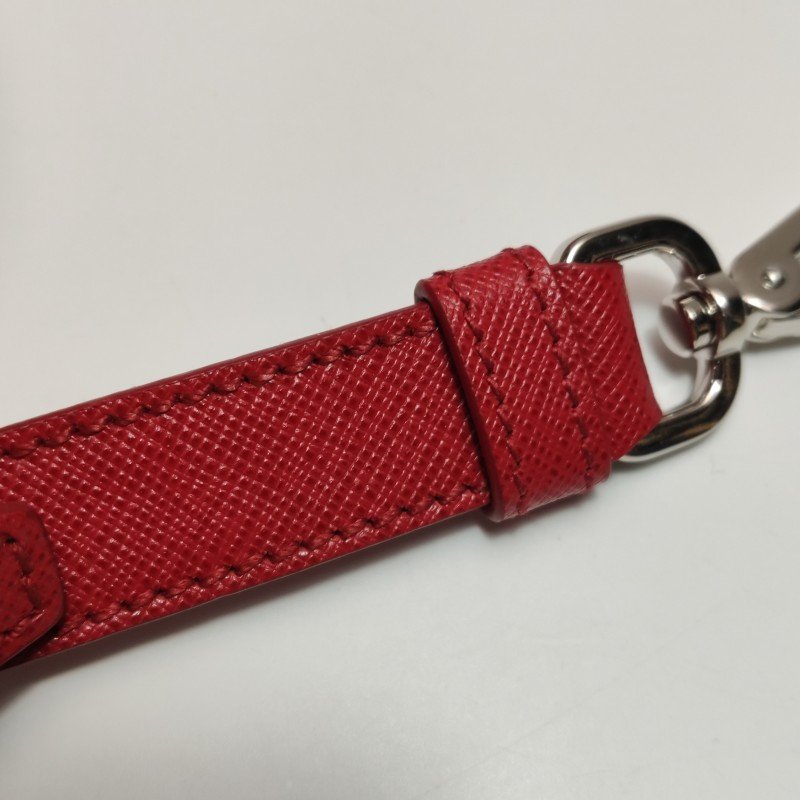 Prada 牛皮純色三角標誌斜背包單肩包-10