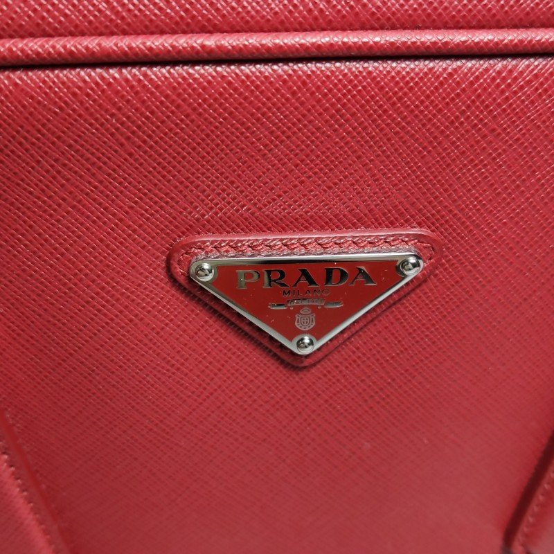 Prada 牛皮純色三角標誌斜背包單肩包-12