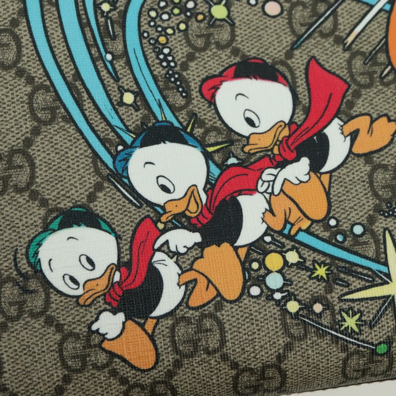 【日本直送】GUCCI GG Supreme 唐老鴨手提包 PVC 兩用 米色 金色 648134 正品 YKZ1322M-20