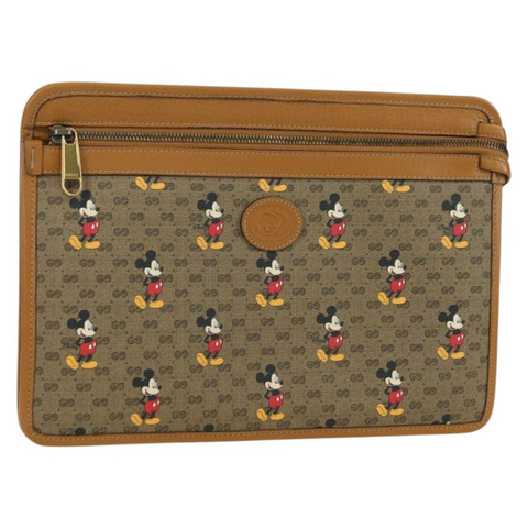 GUCCI GUCCIxDisney GG Supreme 手拿包 PVC 米色金色 602552 正品 YKZ1330M