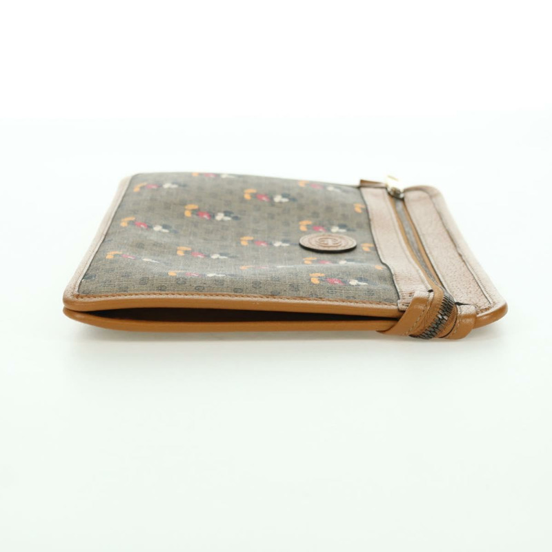 【日本直送】GUCCI GUCCIxDisney GG Supreme 手拿包 PVC 米色金色 602552 正品 YKZ1330M-3