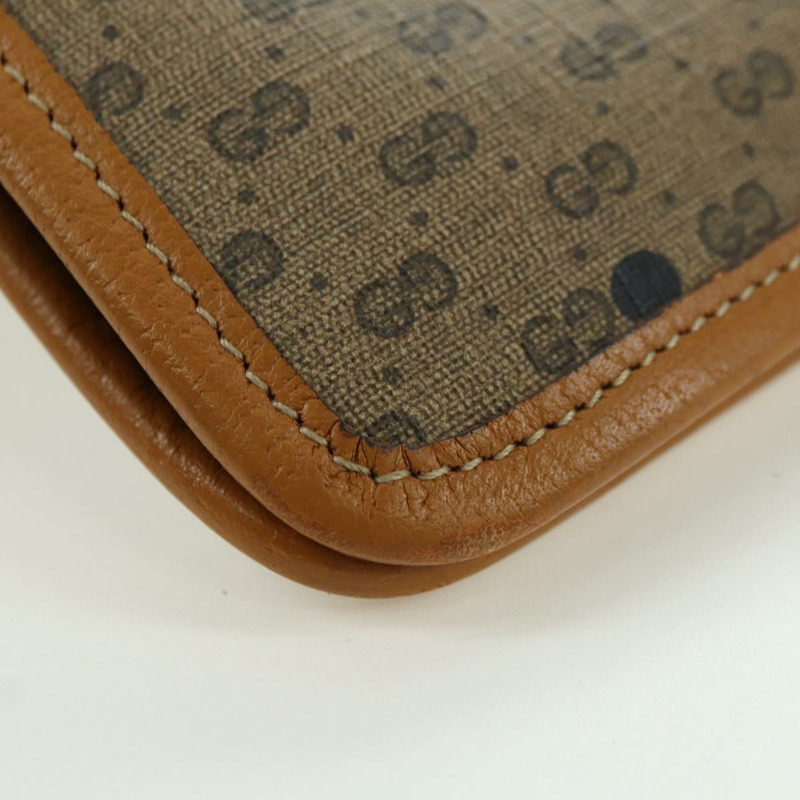 【日本直送】GUCCI GUCCIxDisney GG Supreme 手拿包 PVC 米色金色 602552 正品 YKZ1330M-6