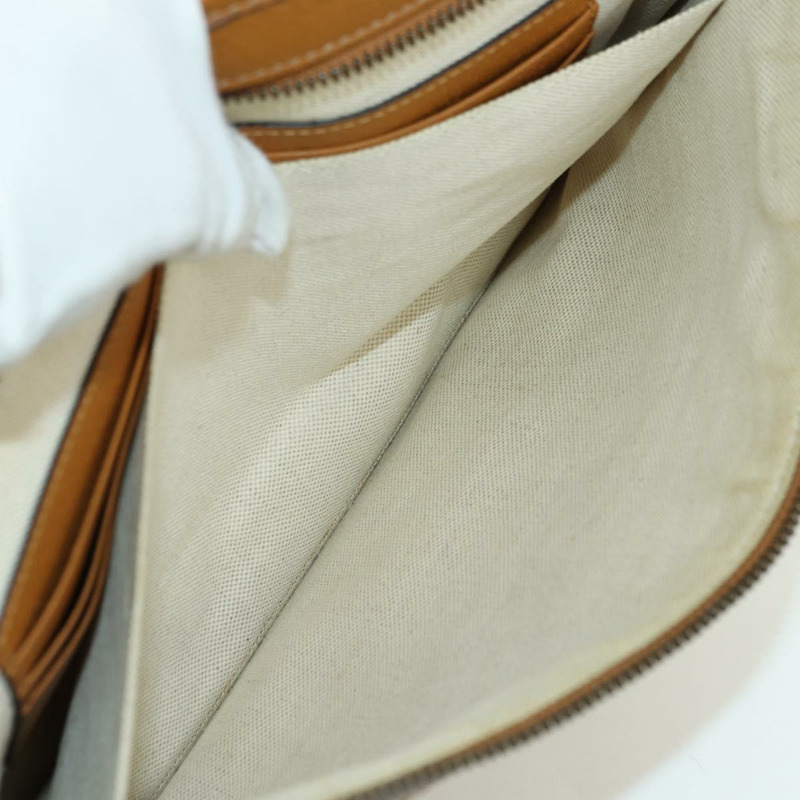 【日本直送】GUCCI GUCCIxDisney GG Supreme 手拿包 PVC 米色金色 602552 正品 YKZ1330M-9