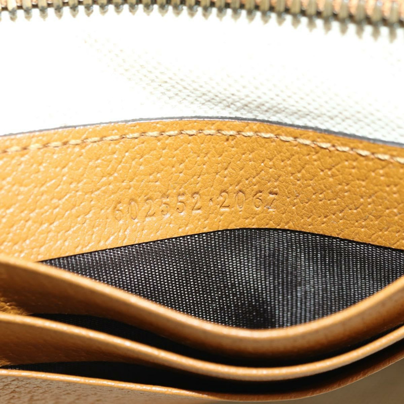 【日本直送】GUCCI GUCCIxDisney GG Supreme 手拿包 PVC 米色金色 602552 正品 YKZ1330M-10