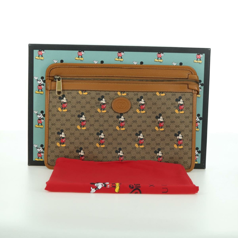 【日本直送】GUCCI GUCCIxDisney GG Supreme 手拿包 PVC 米色金色 602552 正品 YKZ1330M-11