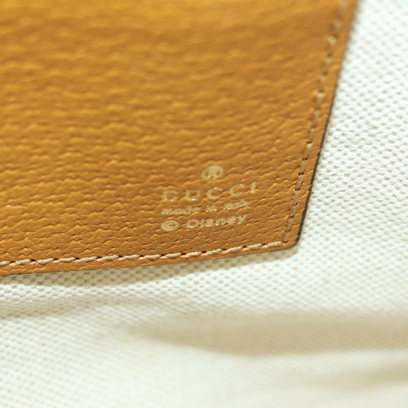 【日本直送】GUCCI GUCCIxDisney GG Supreme 手拿包 PVC 米色金色 602552 正品 YKZ1330M-18