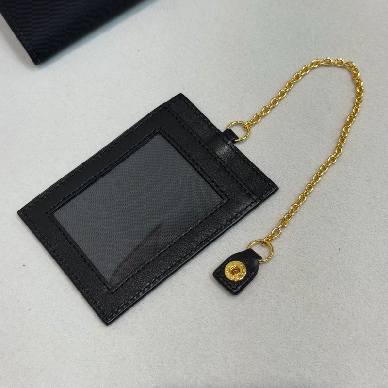 PRADA 黑色皮革拼帆布長夾 XC181-30