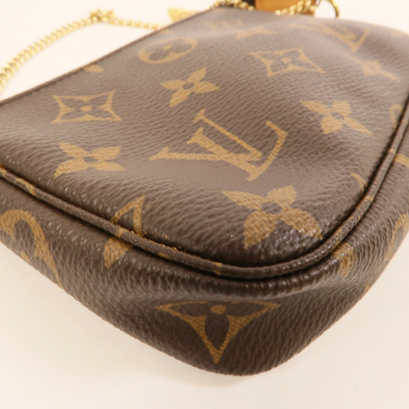 LOUIS VUITTON Monogram Mini Pochette Accessoires金扣手挽袋-10