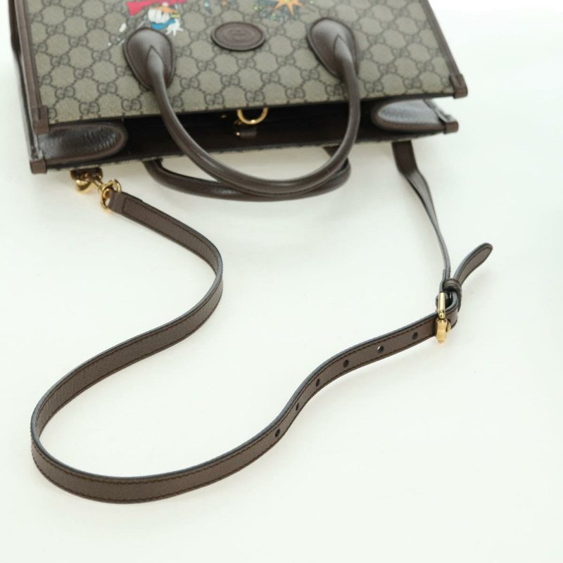 【日本直送】GUCCI GG Supreme 唐老鴨手提包 PVC 兩用 米色/金色 648134 正品 177329M-8