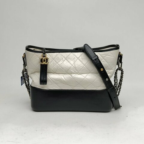 CHANEL GABRIELLE流浪中號白色牛皮28開金銀扣黑底肩背包