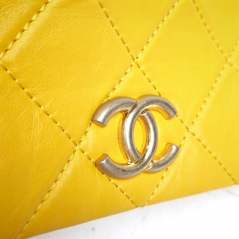 CHANEL 黃色牛皮24開金扣折疊晚宴包手拿包-3