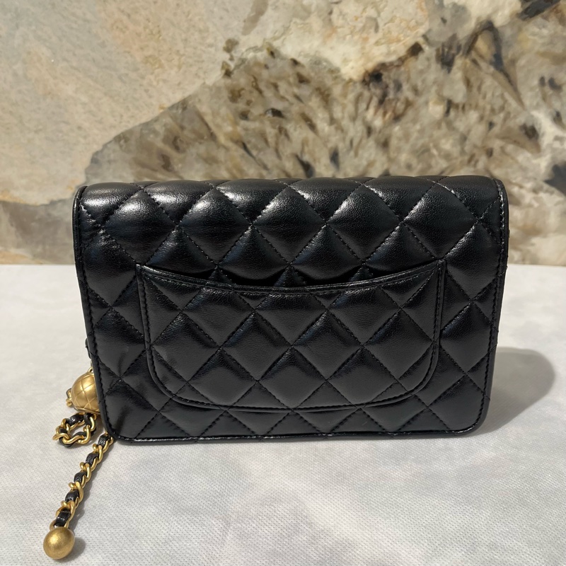 Chanel黑金羊皮轉軸金球coco WOC-3