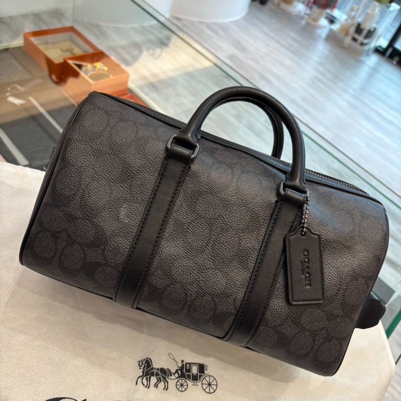 Coach經典老花VENTURER 27號斜背手提行李袋-1