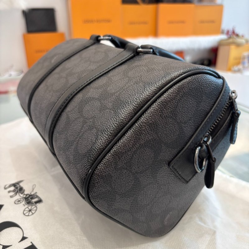 Coach經典老花VENTURER 27號斜背手提行李袋-6