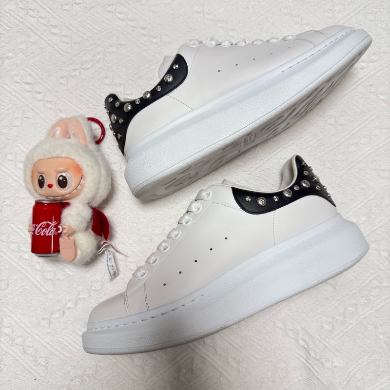 Alexander McQueen 麥昆 黑尾鉚釘裝飾牛皮休閒鞋-1