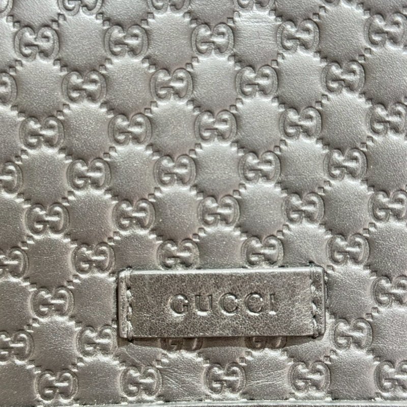 GUCCI 經典老花牛皮束口後背包-6