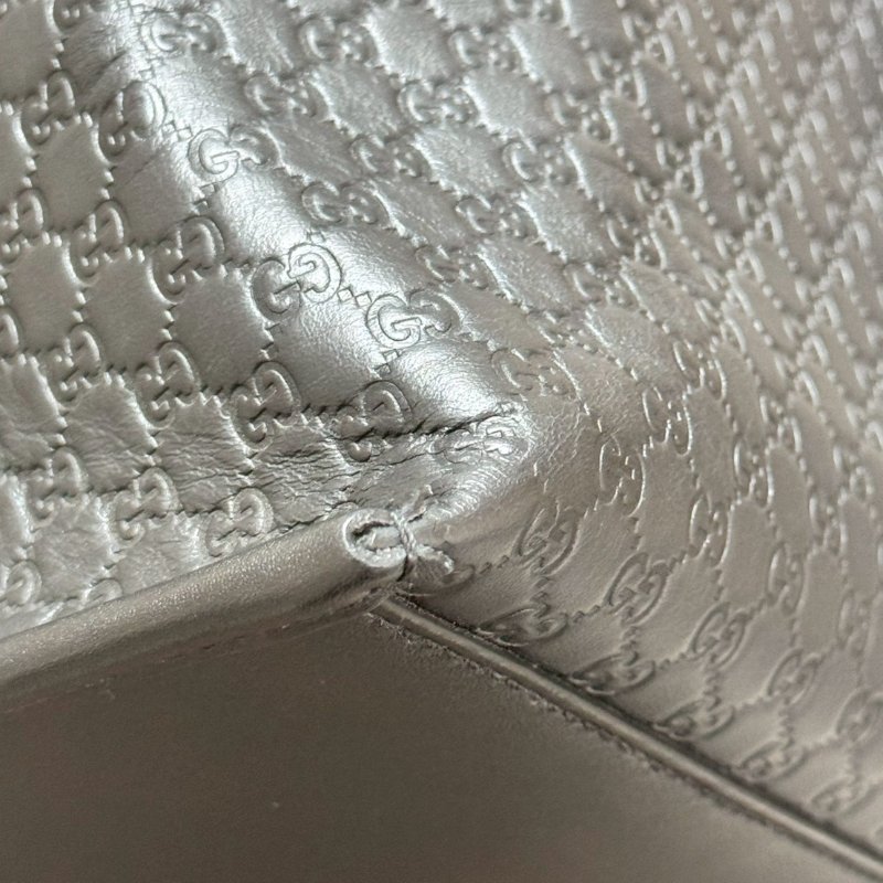 GUCCI 經典老花牛皮束口後背包-8
