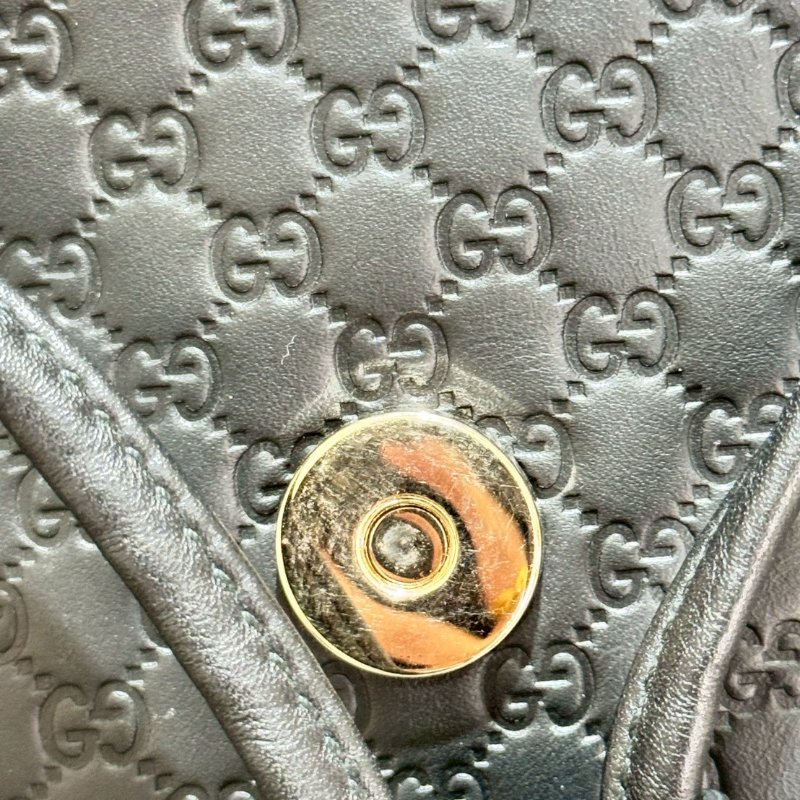 GUCCI 經典老花牛皮束口後背包-14