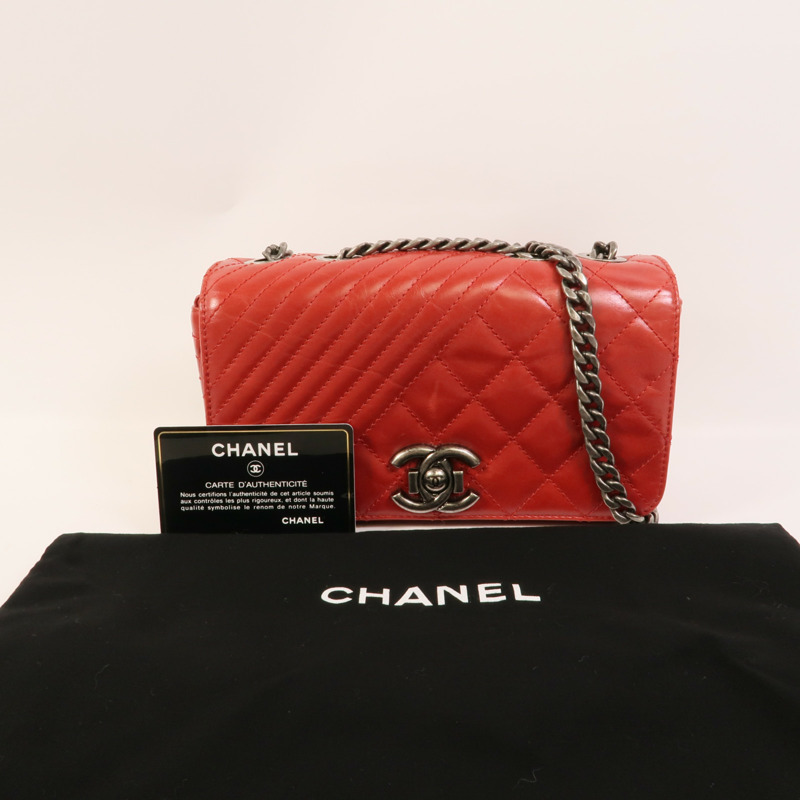 CHANEL 牛皮皮革Coco Boy肩背袋-10