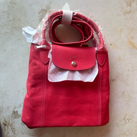 Longchamp 桃紅可折疊皮革款長背帶輕便包