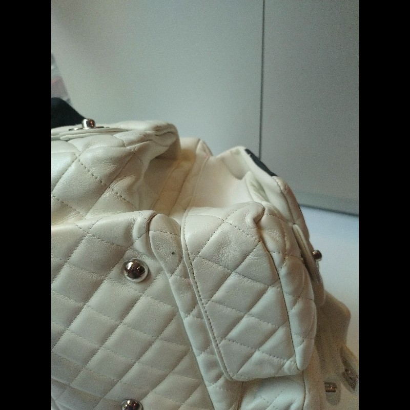 Chanel 黑白熊貓對色康朋多口袋機車包-17