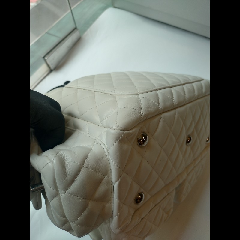 Chanel 黑白熊貓對色康朋多口袋機車包-22