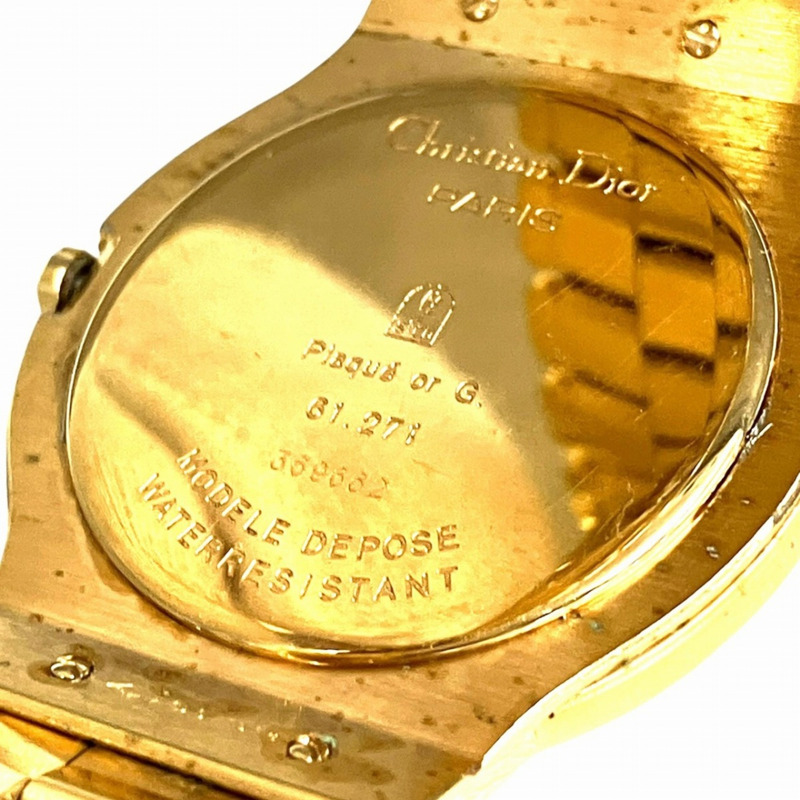 Christian Dior 月相三曆腕錶,總重 70.6 克,鍍金飾面,石英機芯,白色錶盤,貨號 61.271-4