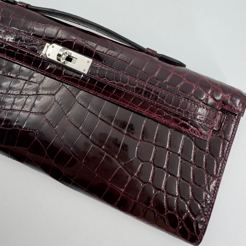Hermès Kelly Cut Bag in Bordeaux Shiny Porosus Crocodile Leather with PHW-1