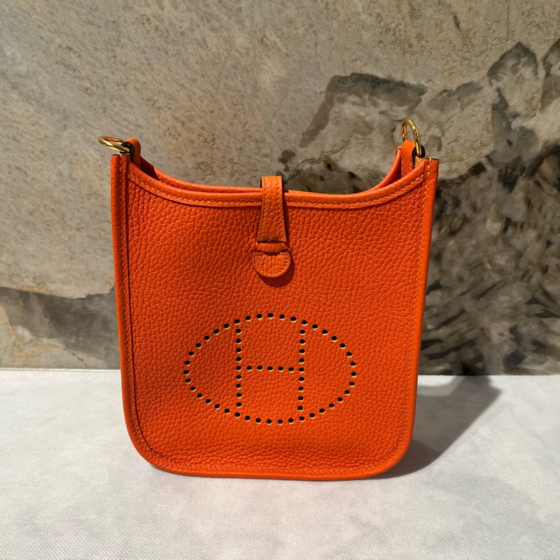 Hermes 橘色牛皮金扣Mini Eyelyne-0