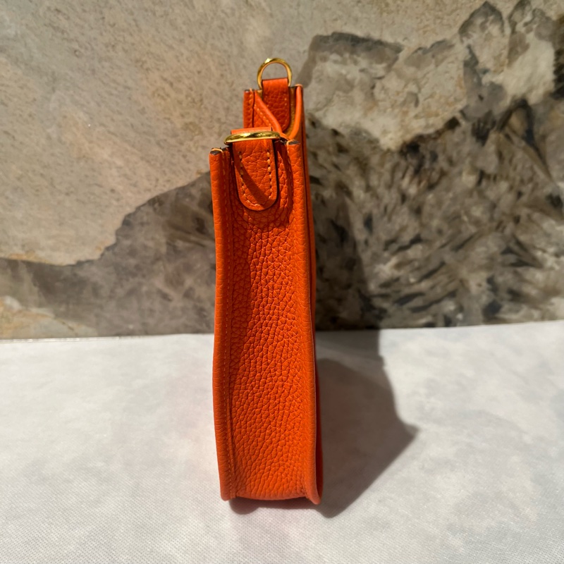 Hermes 橘色牛皮金扣Mini Eyelyne-1