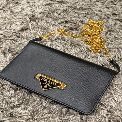 PRADA 普拉達 Saffiano 穿釦三角牌防刮牛皮雙層手拿/鍊包(黑色)