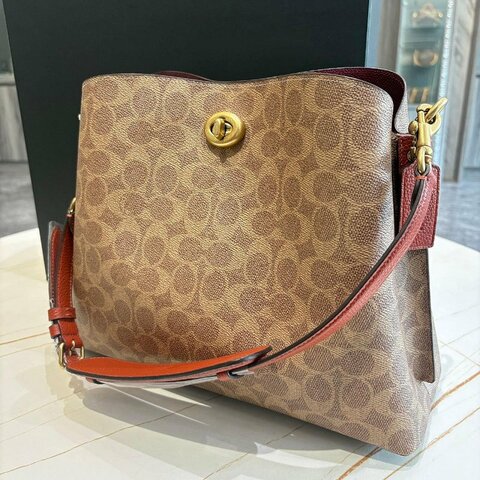 COACH 老花塗層帆布印花肩背袋
