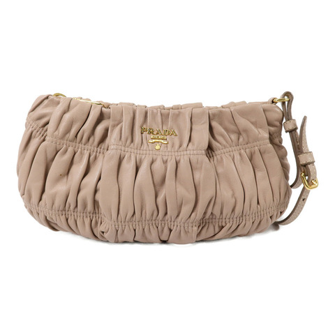 PRADA 牛皮皮革Gaufre Wristlet金扣手拿包黑色