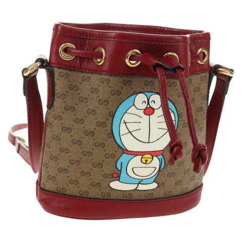 GUCCI GUCCI × Doraemon 聯名款 Micro GG Supreme 手提包 PVC 米色 金色 647801 正品 185900M