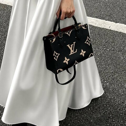 Louis Vuitton -黑色拚米白牛皮壓紋On the go - PM托特包