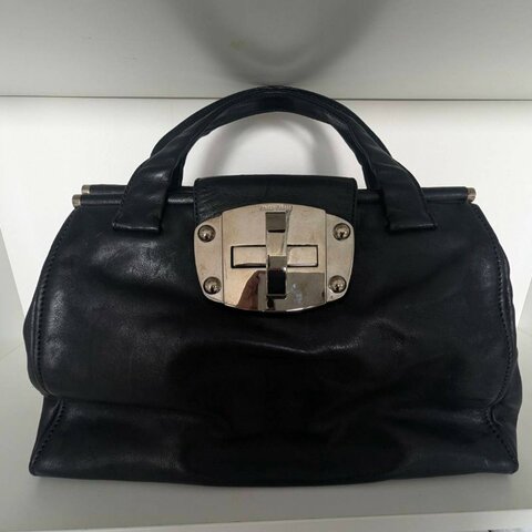 Miu Miu Vitello 黑色小牛皮金屬轉扣手提公事包