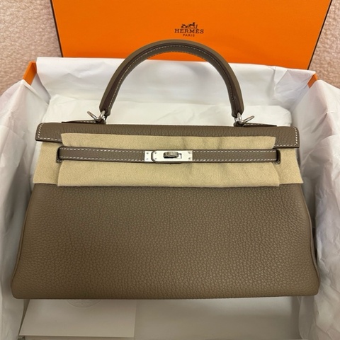 愛馬仕 Hermès Kelly 25 大象灰（Etoupe），銀扣，Togo 皮，全新全套，W 刻印，24 年 12 月票據。