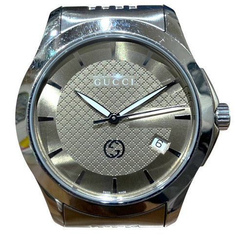 Gucci G-Timeless腕錶，總重96.4克，不鏽鋼材質，石英機芯，淺棕色錶盤。 126.4