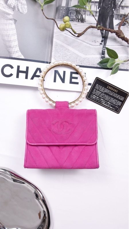 Chanel 1开芭比粉珍珠手柄手提包晚宴包