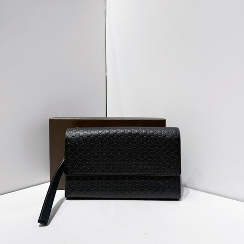 Gucci 壓紋logo老花黑銀配色手拿包