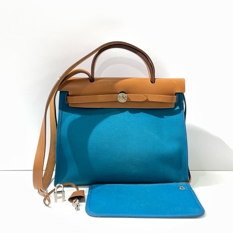 愛馬仕herbag31cm 藍色帆布拼金棕皮C刻