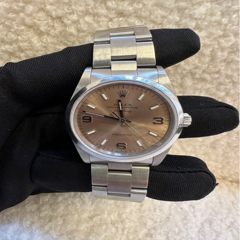 勞力士Rolex空中霸王系列14000茶粉色錶盤腕錶，34mm錶徑，自動機械機芯，低調奢華，風格高貴沉穩。