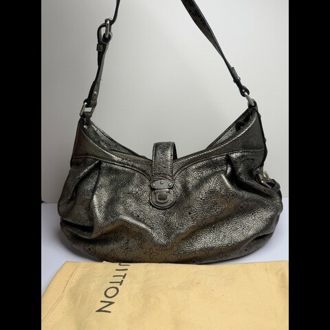 LouisVuitton/路易威登 全皮鏤空 hobo 單肩包，經典款，容量超大