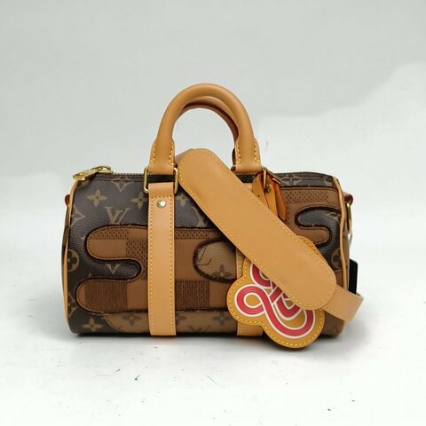 LOUIS VUITTON 老花牛皮革晶片KEEPALL25Nigo聯名肩背包