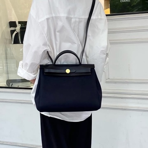 愛馬仕Hermes herbag31 黑色皮革拼帆布金釦手提斜背包
