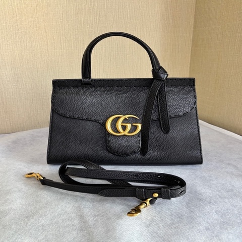 gucci黑金牛皮手提包