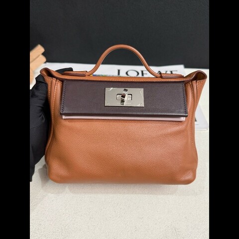 Hermès Mini 24/24 
Gold / Rouge Sellier / Mauve Sylvestre with Palladium Hardware